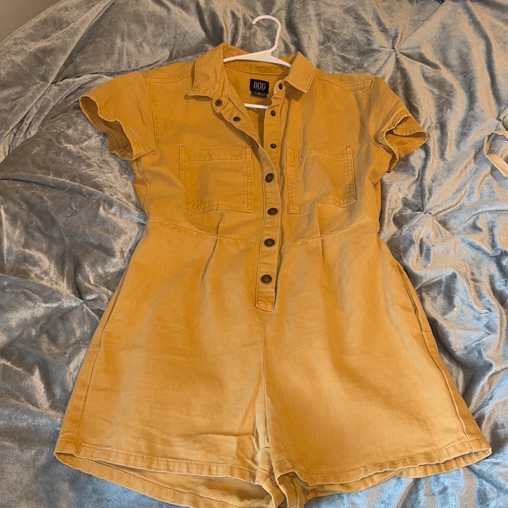Yellow denim romper.